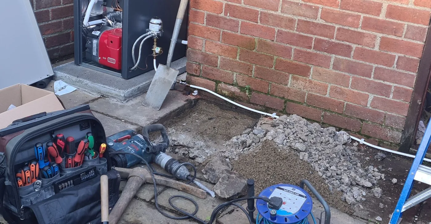 Gas boiler installation Belfast — Kelly Heating NI engineer at work