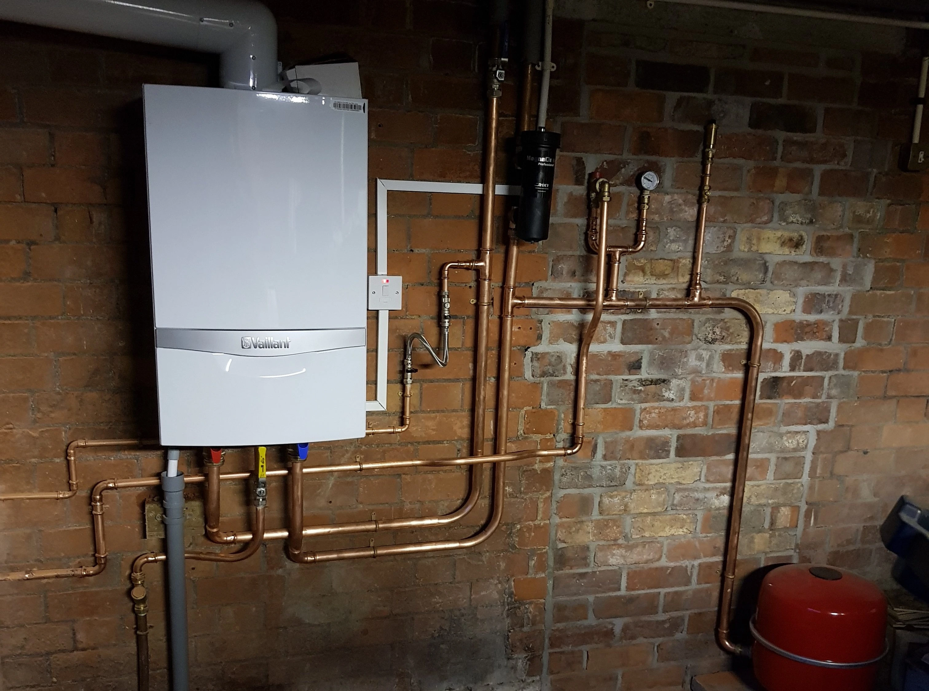 Worcester Bosch Vaillant boiler replacement in Belfast — copper pipework, magnetic filter, new installation by Kelly Heating NI