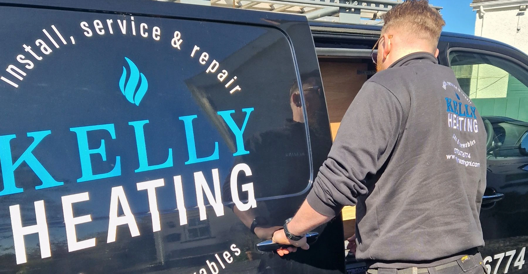 Kelly Heating NI engineer loading tools for a Belfast boiler installation callout — Gas Safe registered
